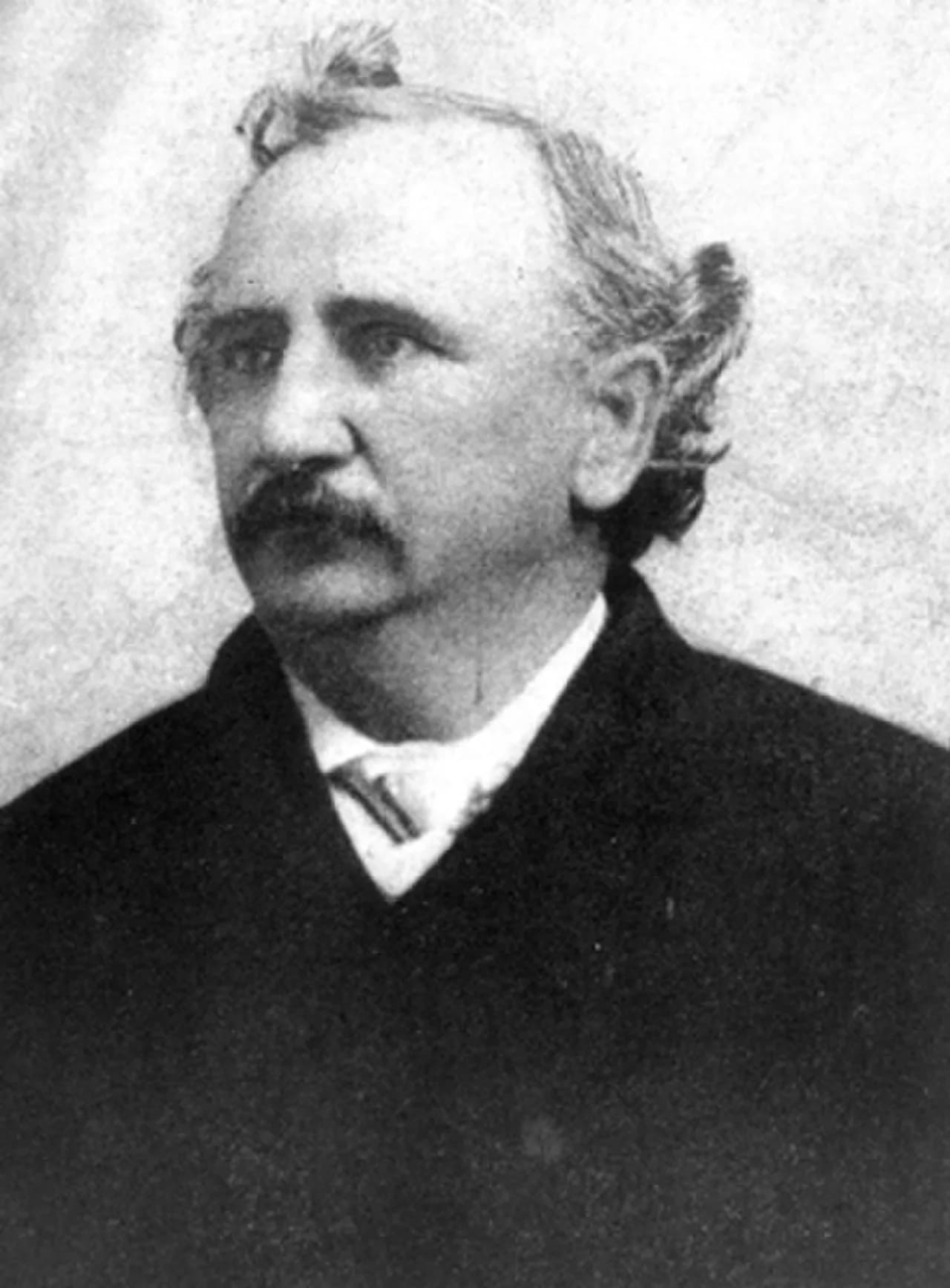 Thomas E. Miller