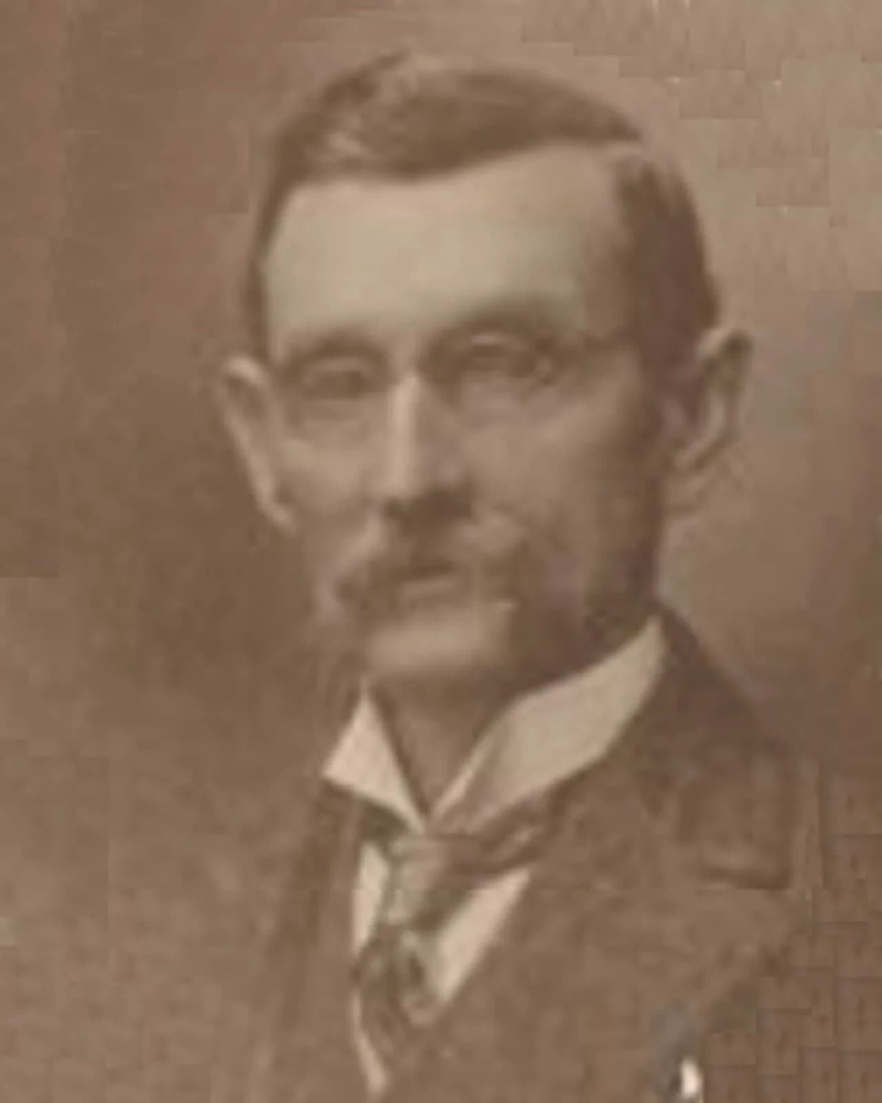 E. Tucker Hughes