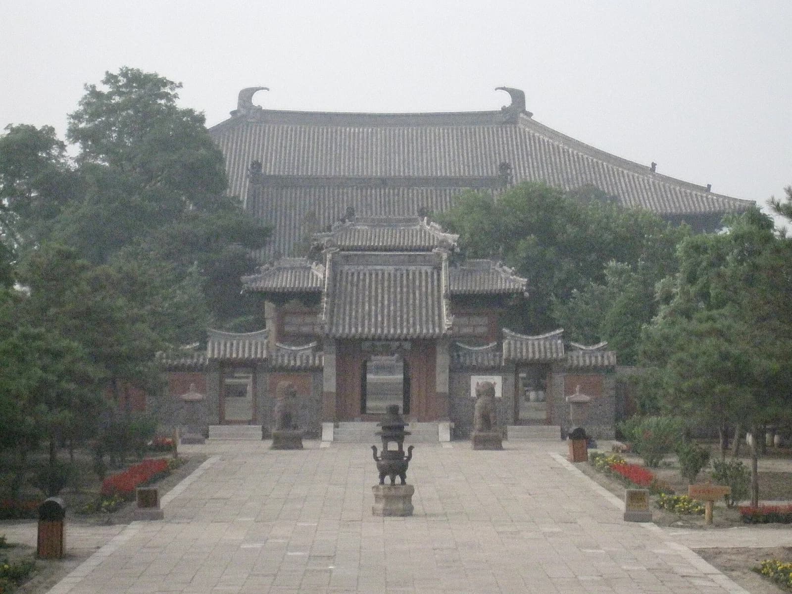 Yi