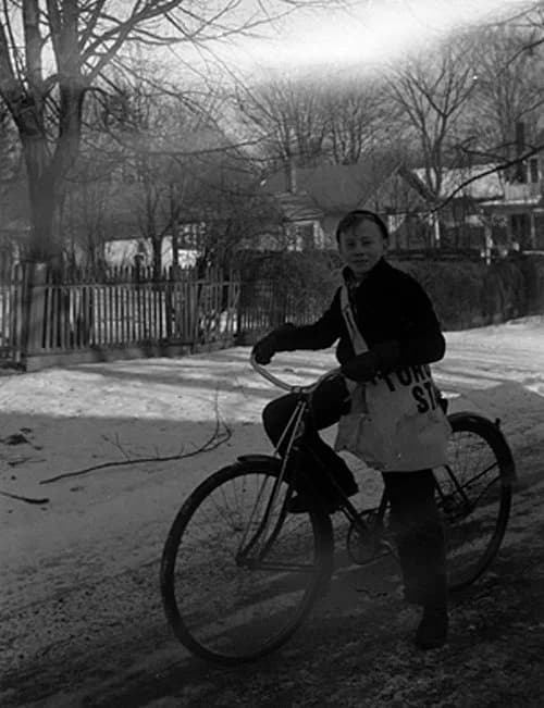 newspaper delivery person