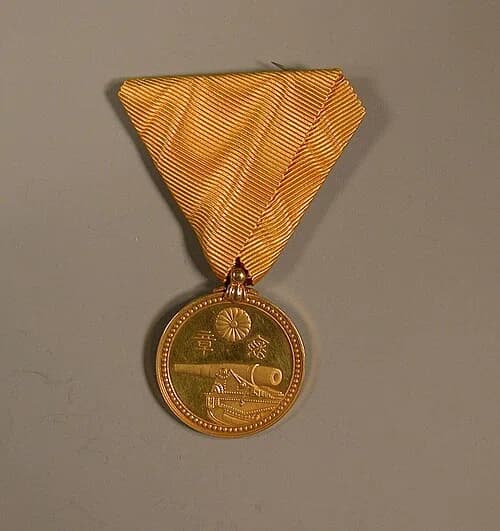 Gold Medal with Yellow Ribbon