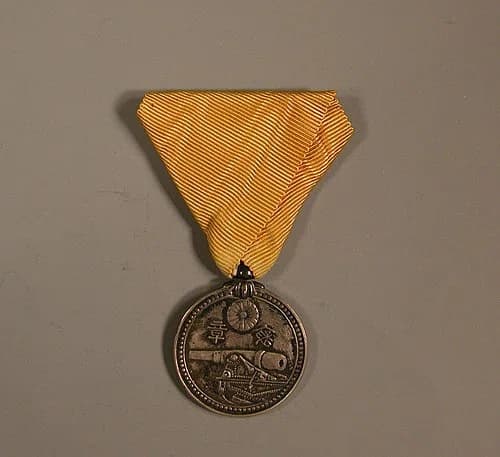 Silver Medal with Yellow Ribbon