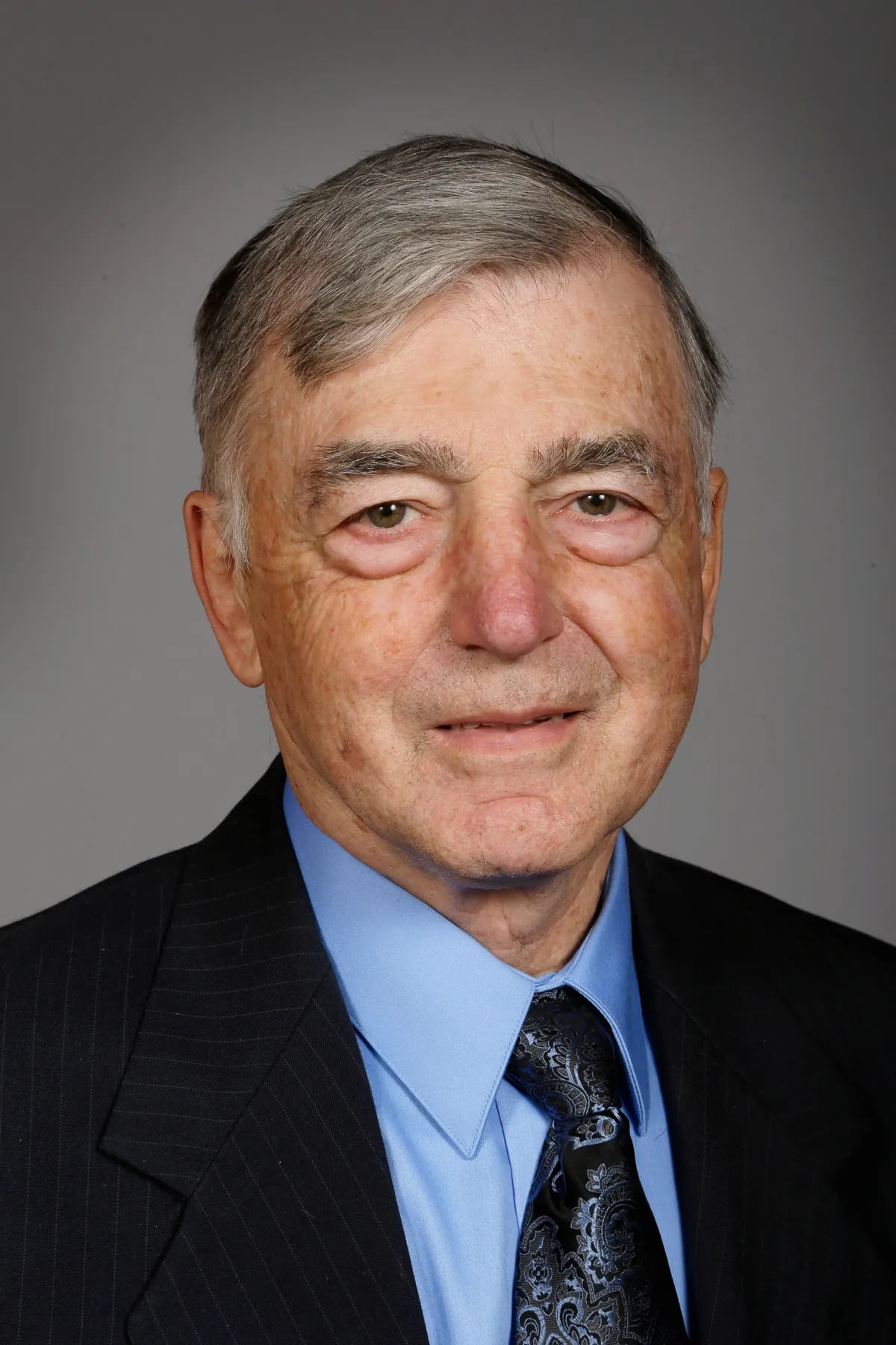 Portrait of Julian Garrett (1940–2026) – memorial page