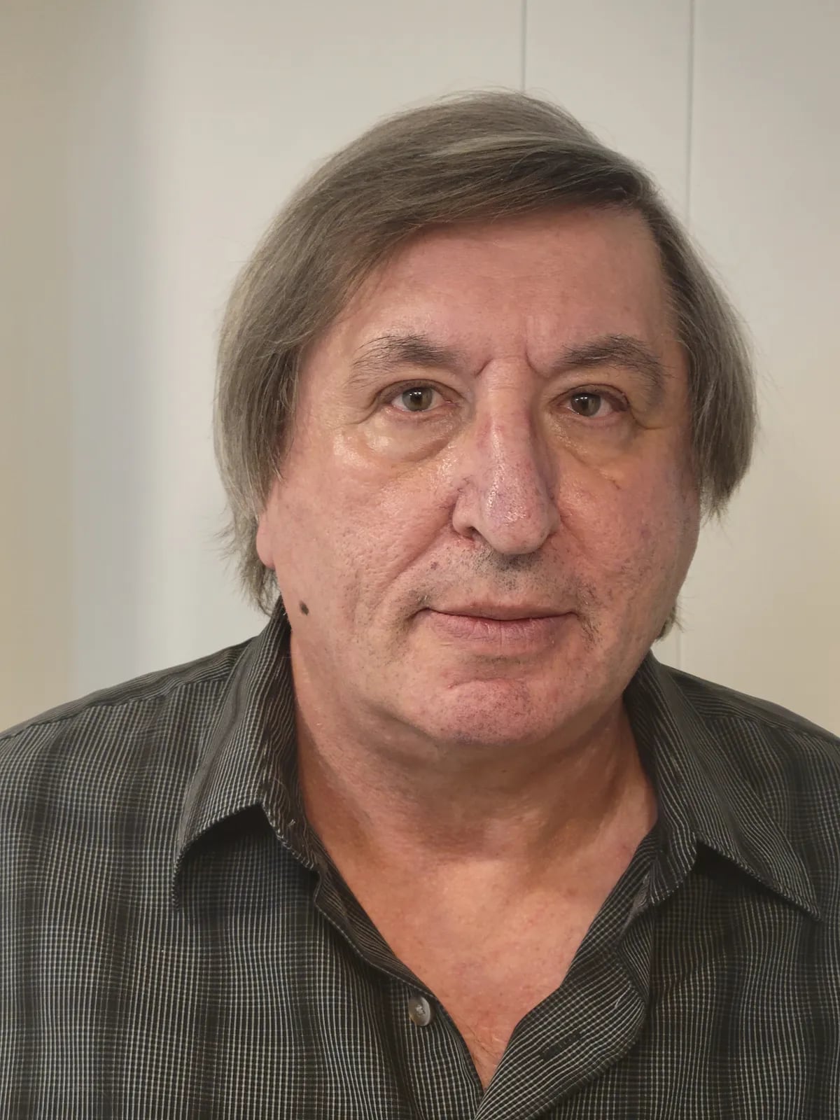 Porträt von Eugene Plotkin (1955–2026) – Gedenkseite