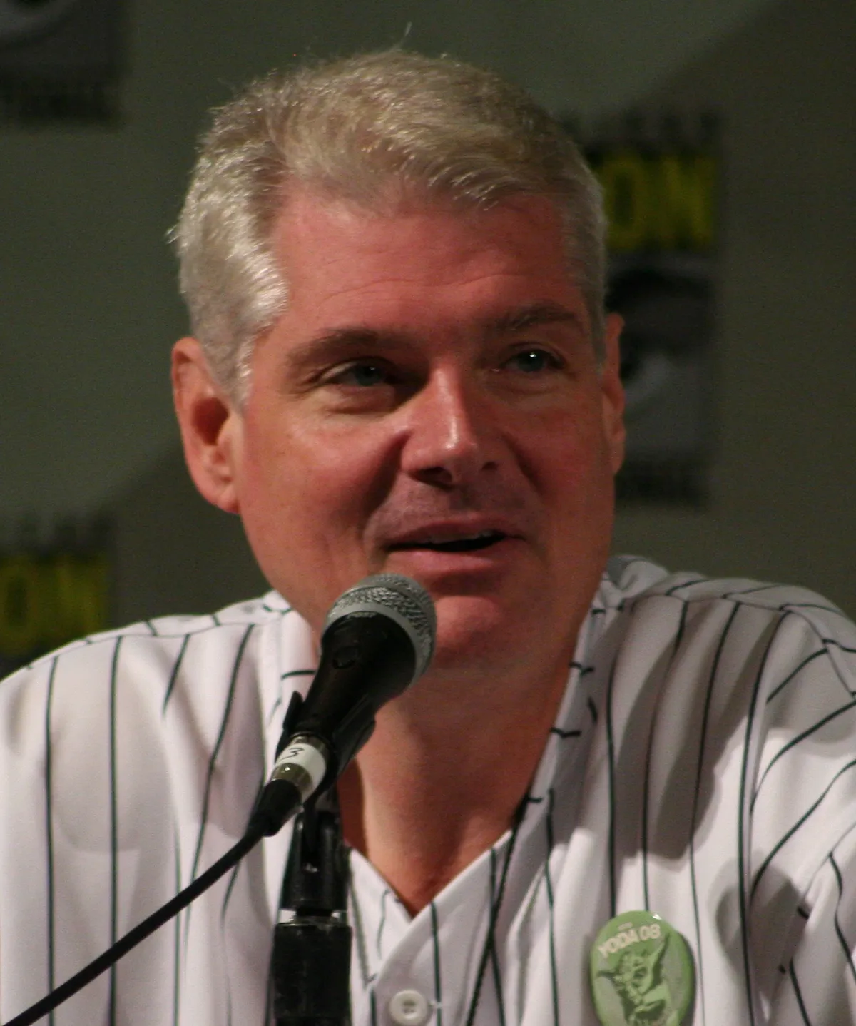 Portrait of Tom Kane (1962–2026) – memorial page