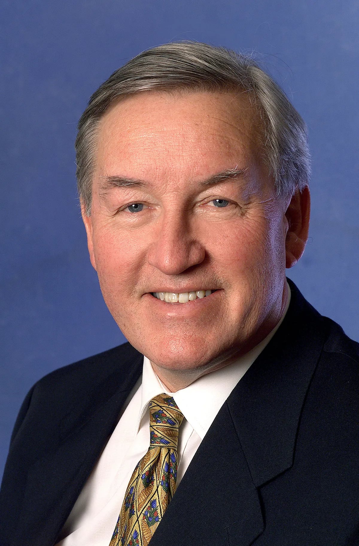 Portrait of Norman Lacy (1941–2026) – memorial page