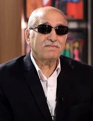 Porträt von Ibrahim al-Ajluni (1948–2022) – Gedenkseite
