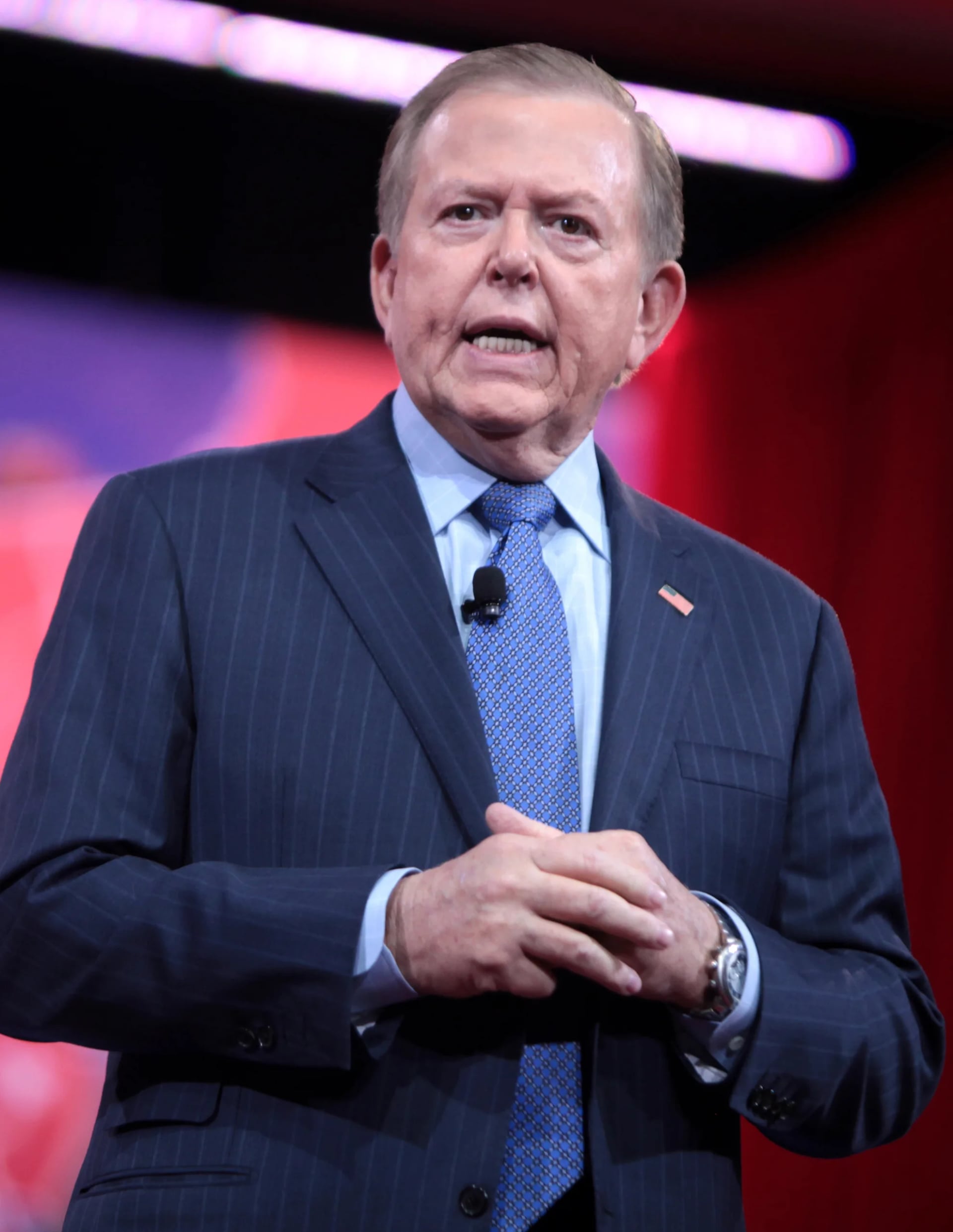Portrait of Lou Dobbs (1945–2024) – memorial page