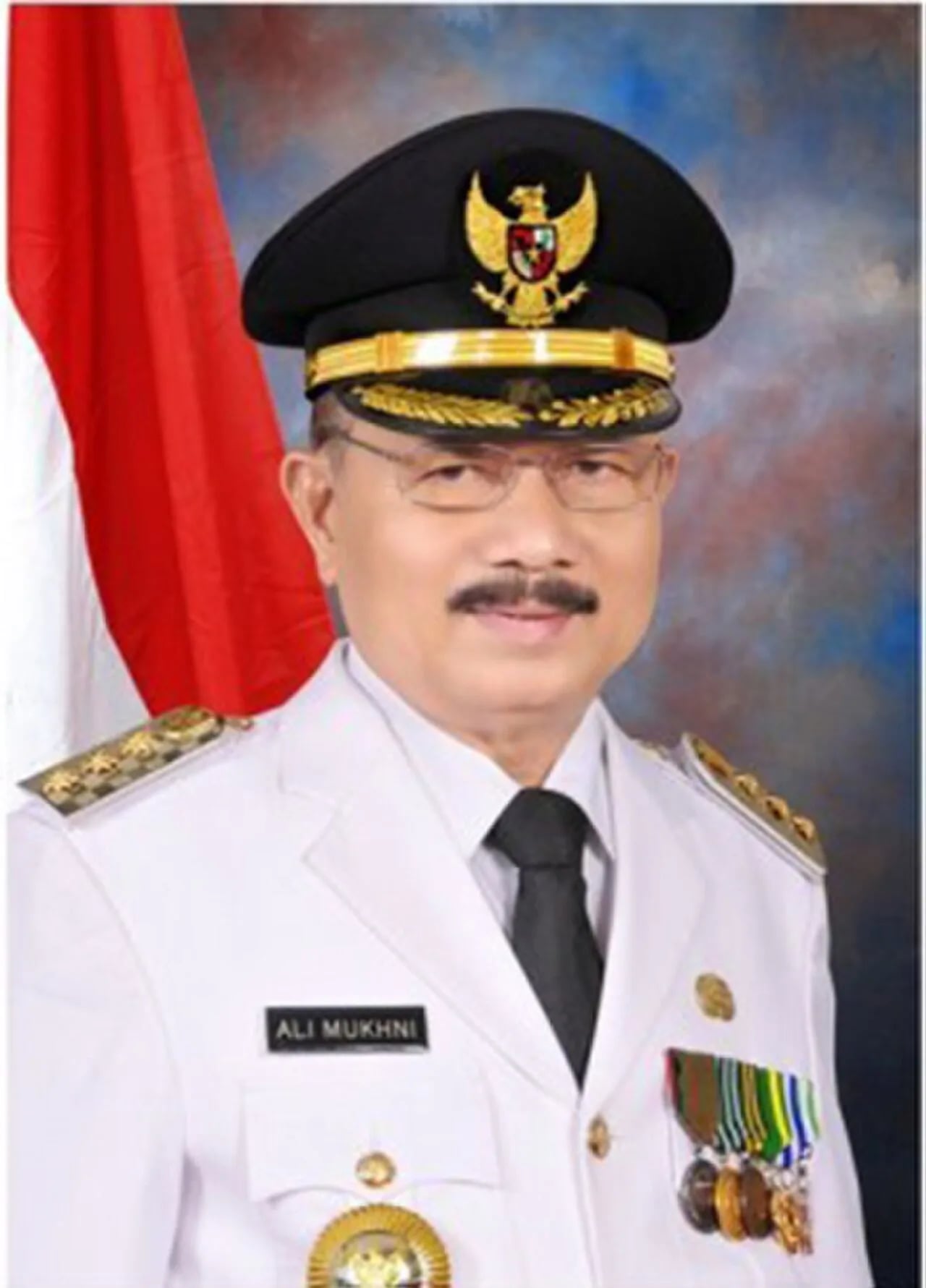 Portrait of Ali Mukhni (1956–2023) – memorial page