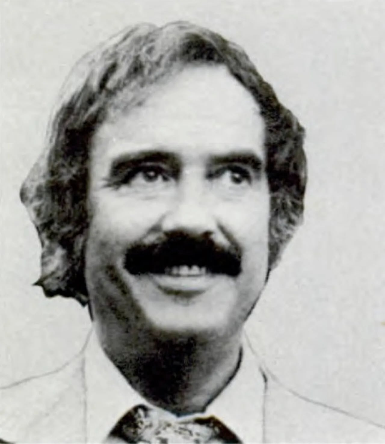 Porträt von John Lowell Burton (1932–2025) – Gedenkseite