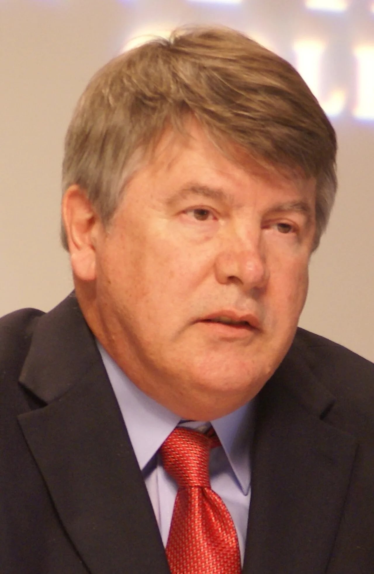 Portrait of John Wolfe (1954–2023) – memorial page
