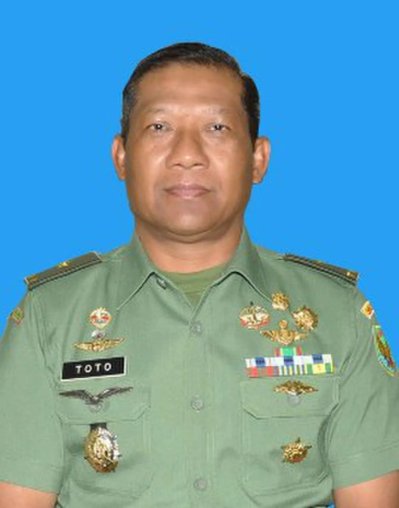 Portrait of Toto S Moerasad (1957–2021) – memorial page