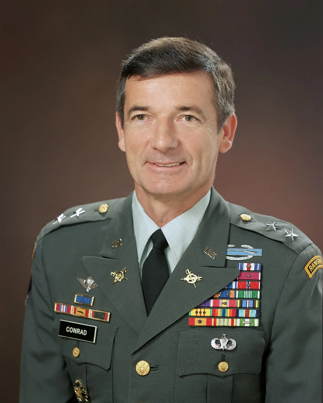 Portrait of Michael J. Conrad (1933–2023) – memorial page