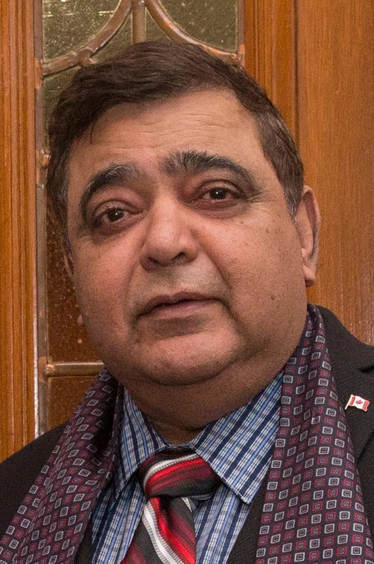 Porträt von Deepak Obhrai (1950–2019) – Gedenkseite