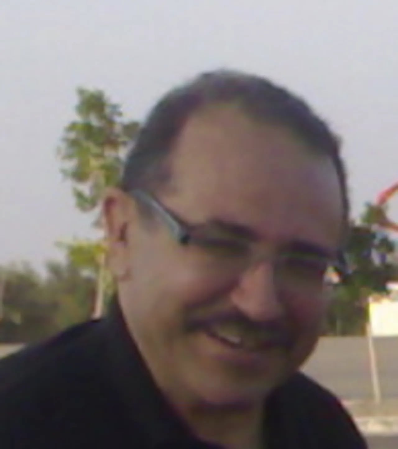Portrait of Hassine Raouf Hamza (1949–2011) – memorial page