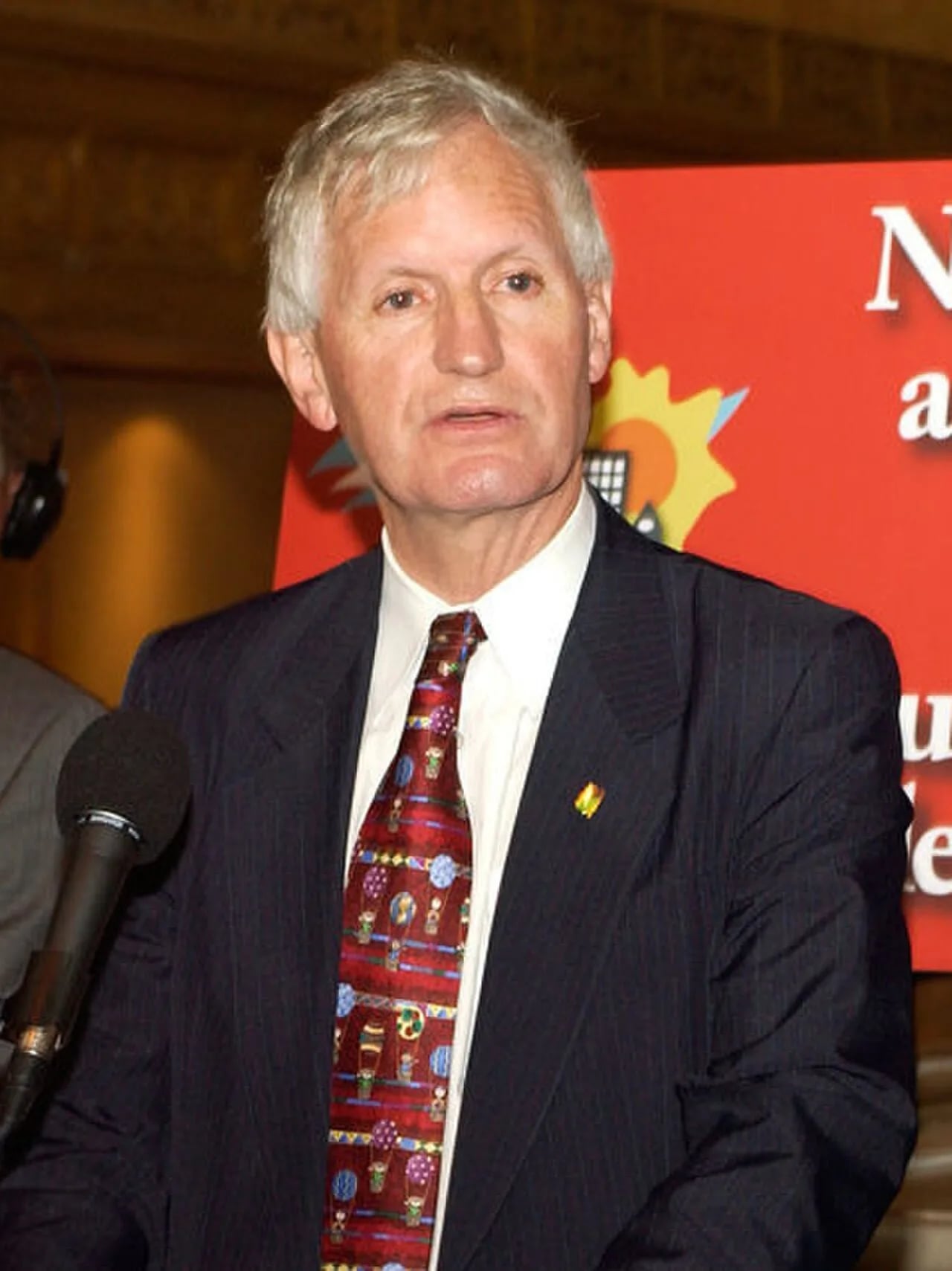 Porträt von John Godfrey (1942–2023) – Gedenkseite