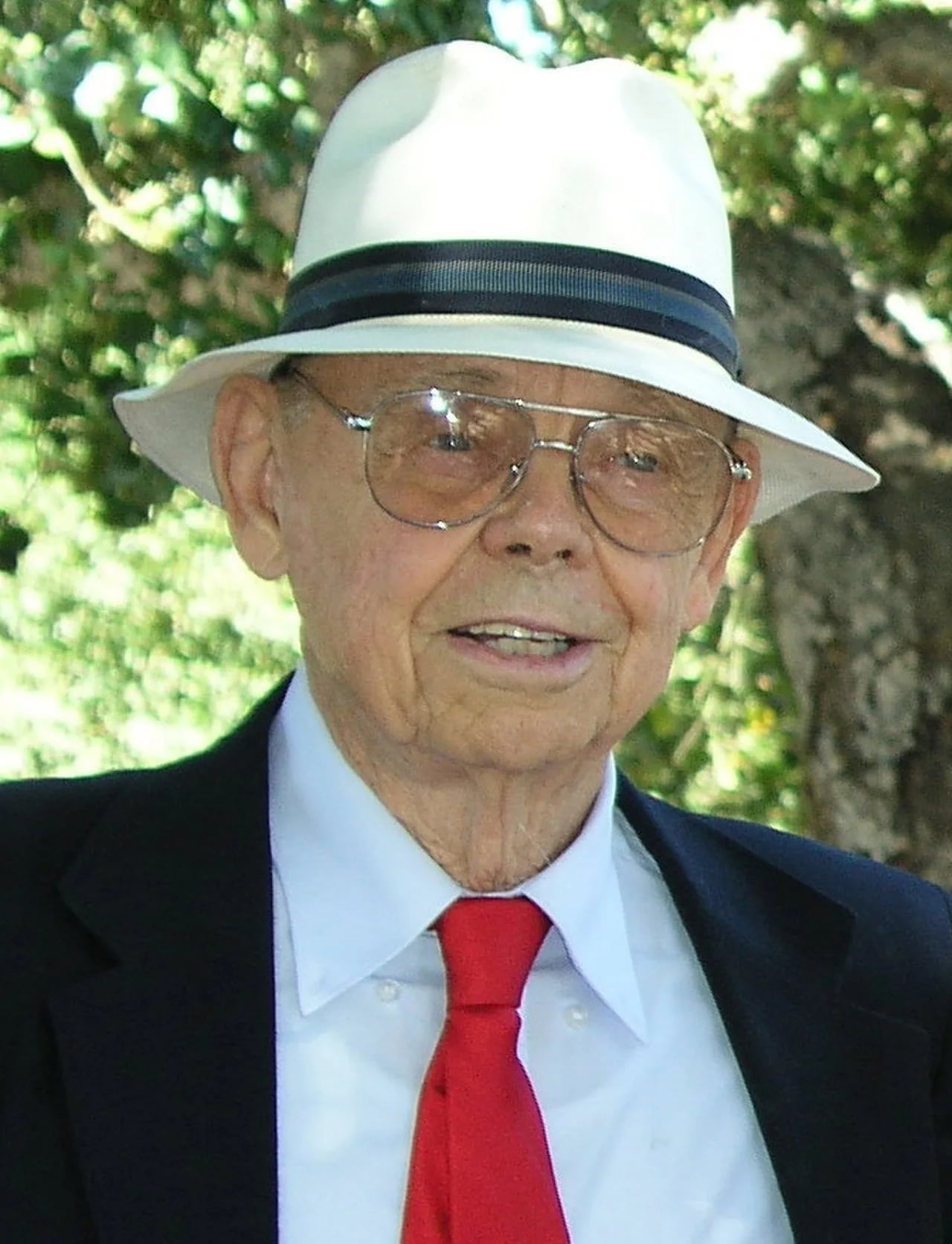 Portrait of Conrad Longmire (1921–2010) – memorial page