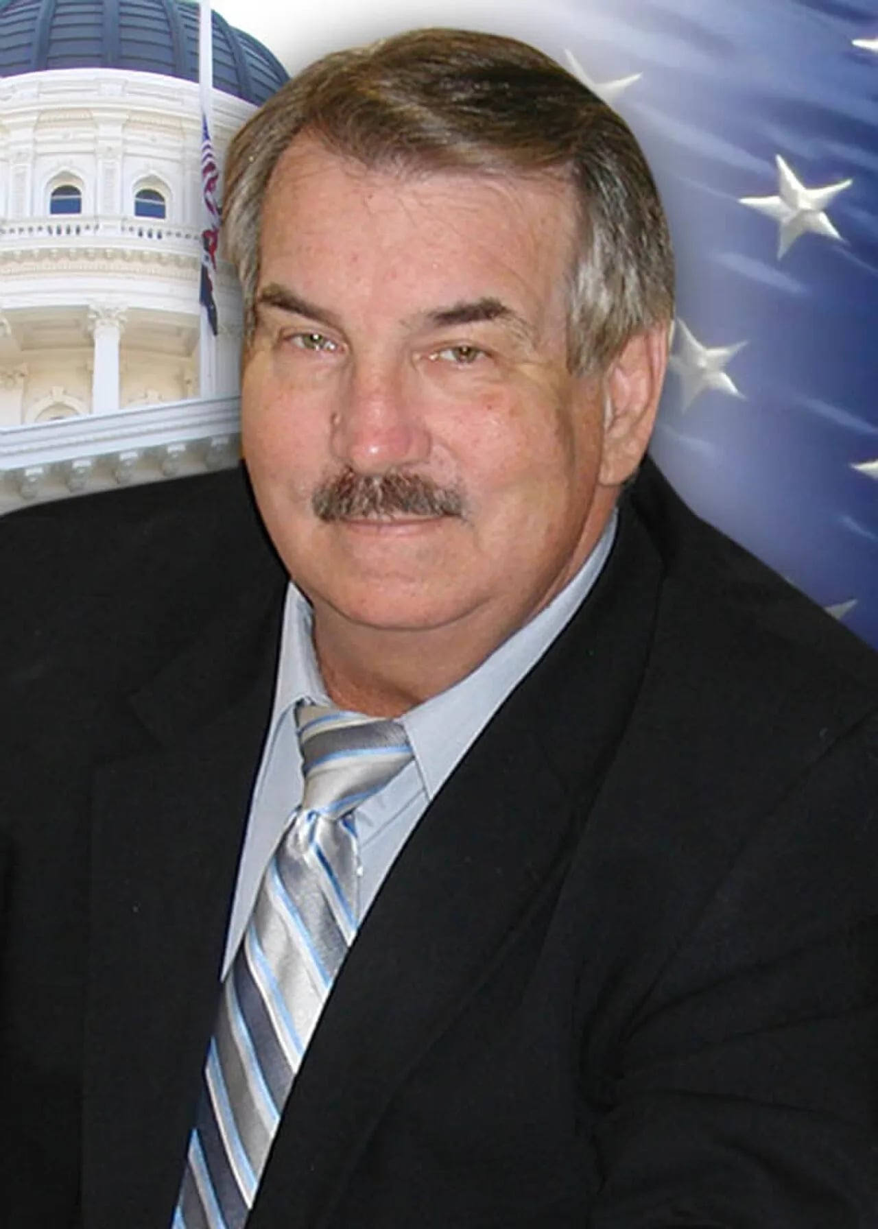 Portrait of Dan Logue (1950–2021) – memorial page