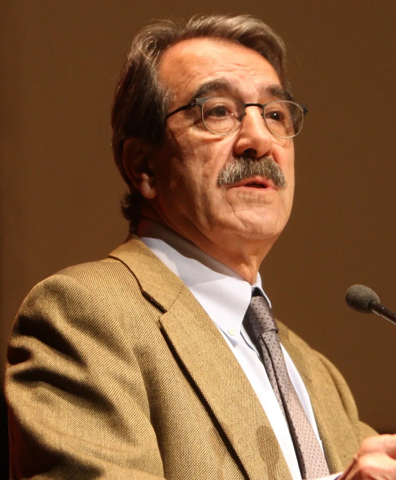 Portrait of Emilio Ontiveros (1948–2022) – memorial page