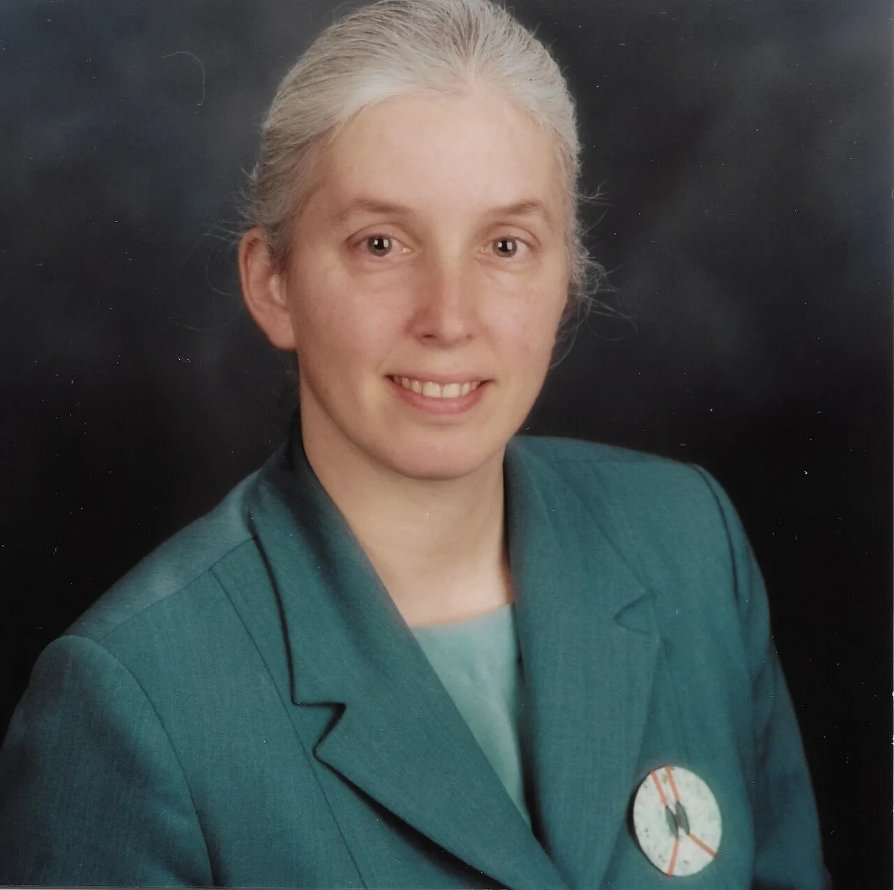 Portrait of Susan F. Wood (1958–2025) – memorial page