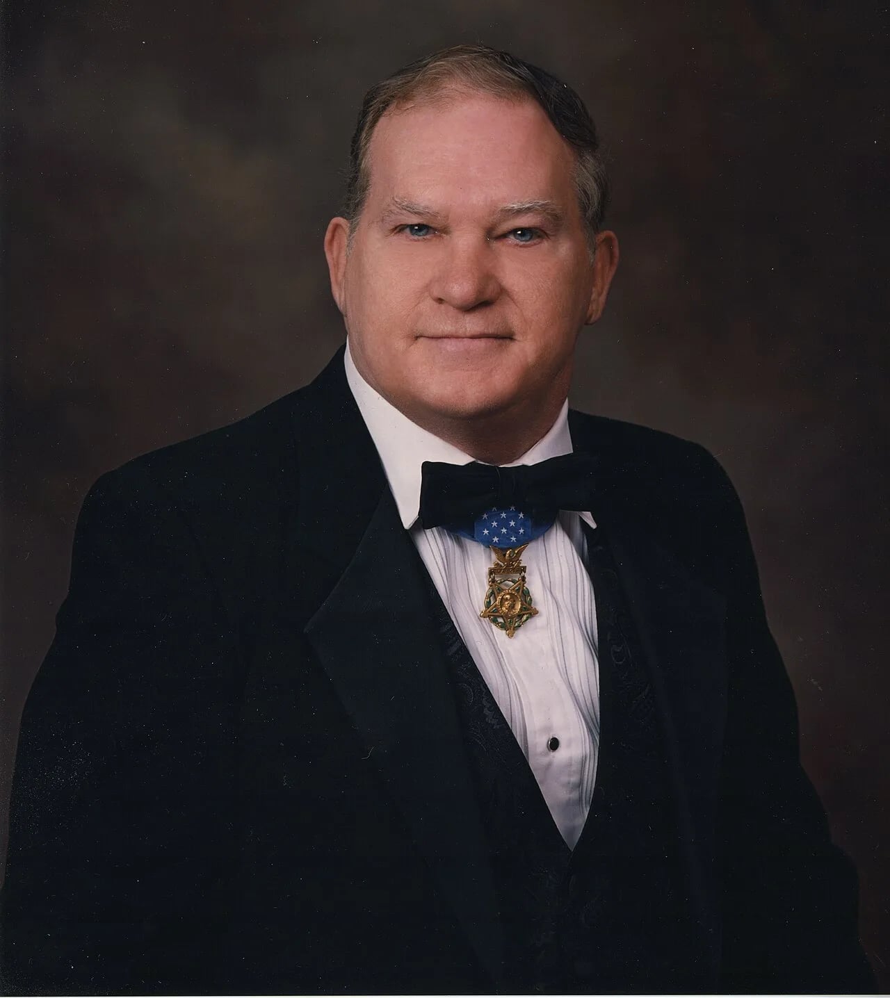 Portrait of John F. Baker, Jr. (1945–2012) – memorial page