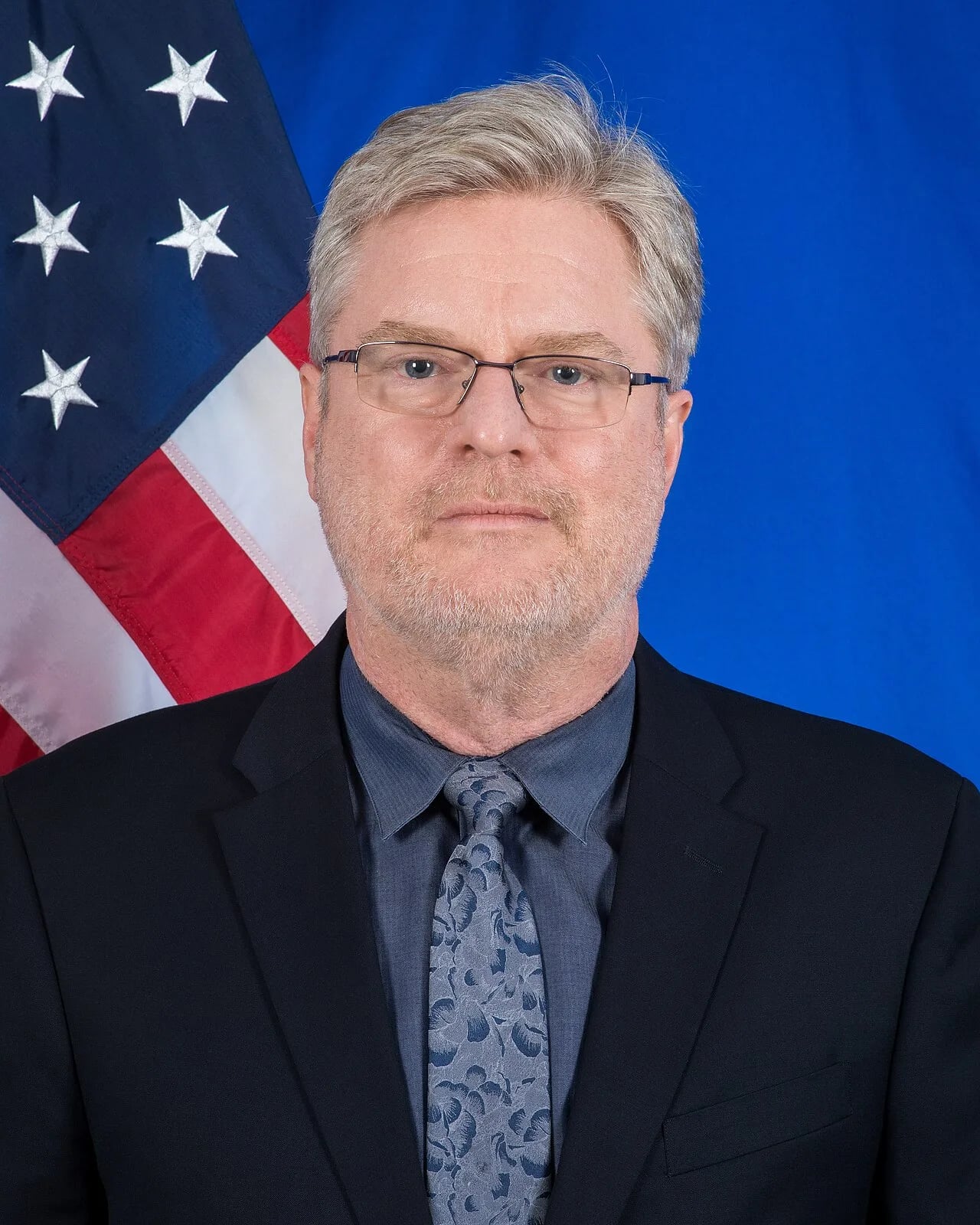 Portrait of Simon Henshaw (1960–2020) – memorial page