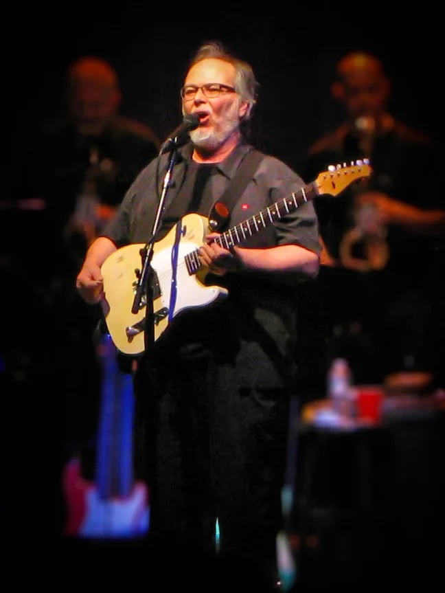 Portrait of Walter Becker (1950–2017) – memorial page