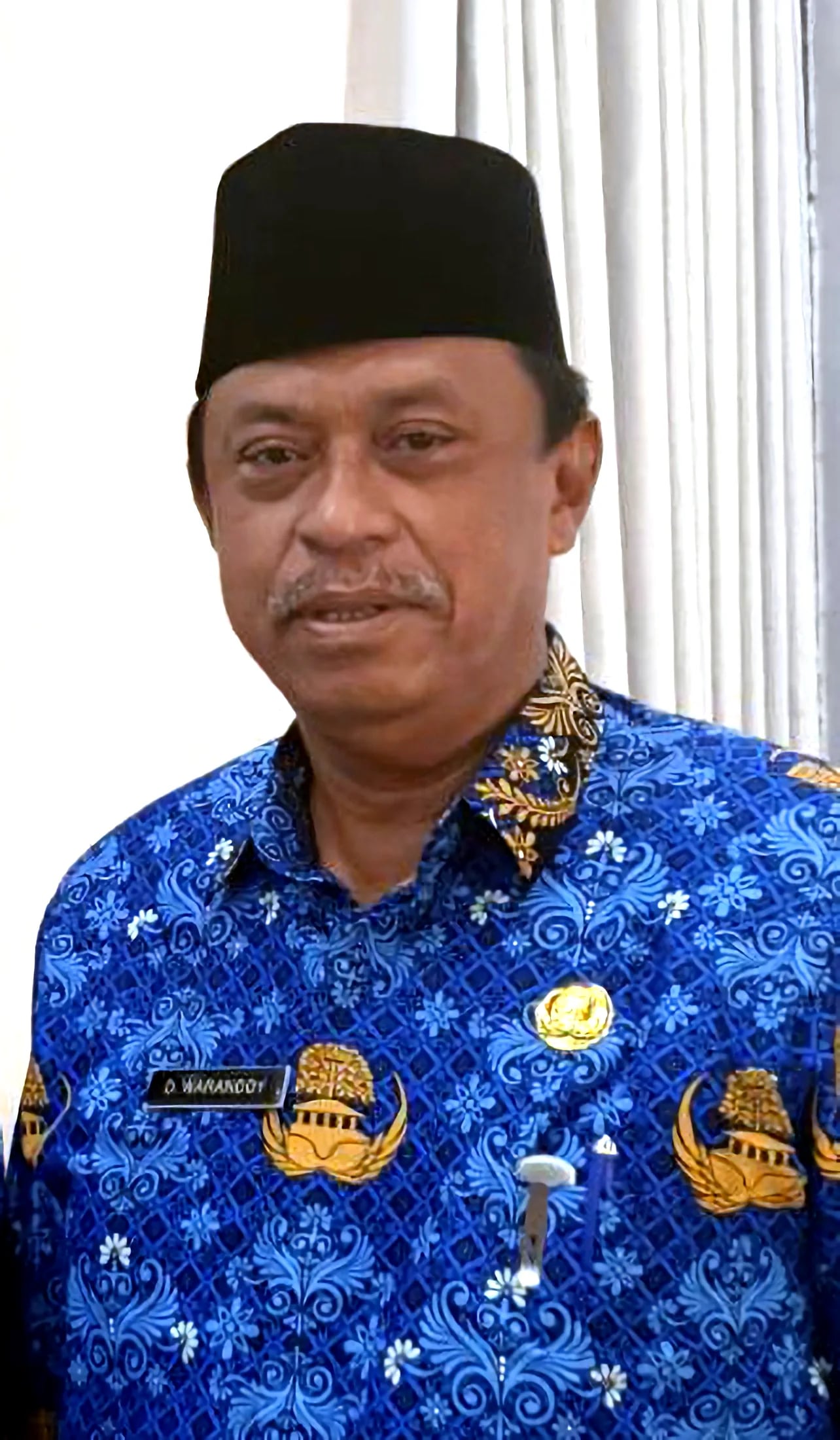 Portrait of Domu Warandoy (1967–2022) – memorial page