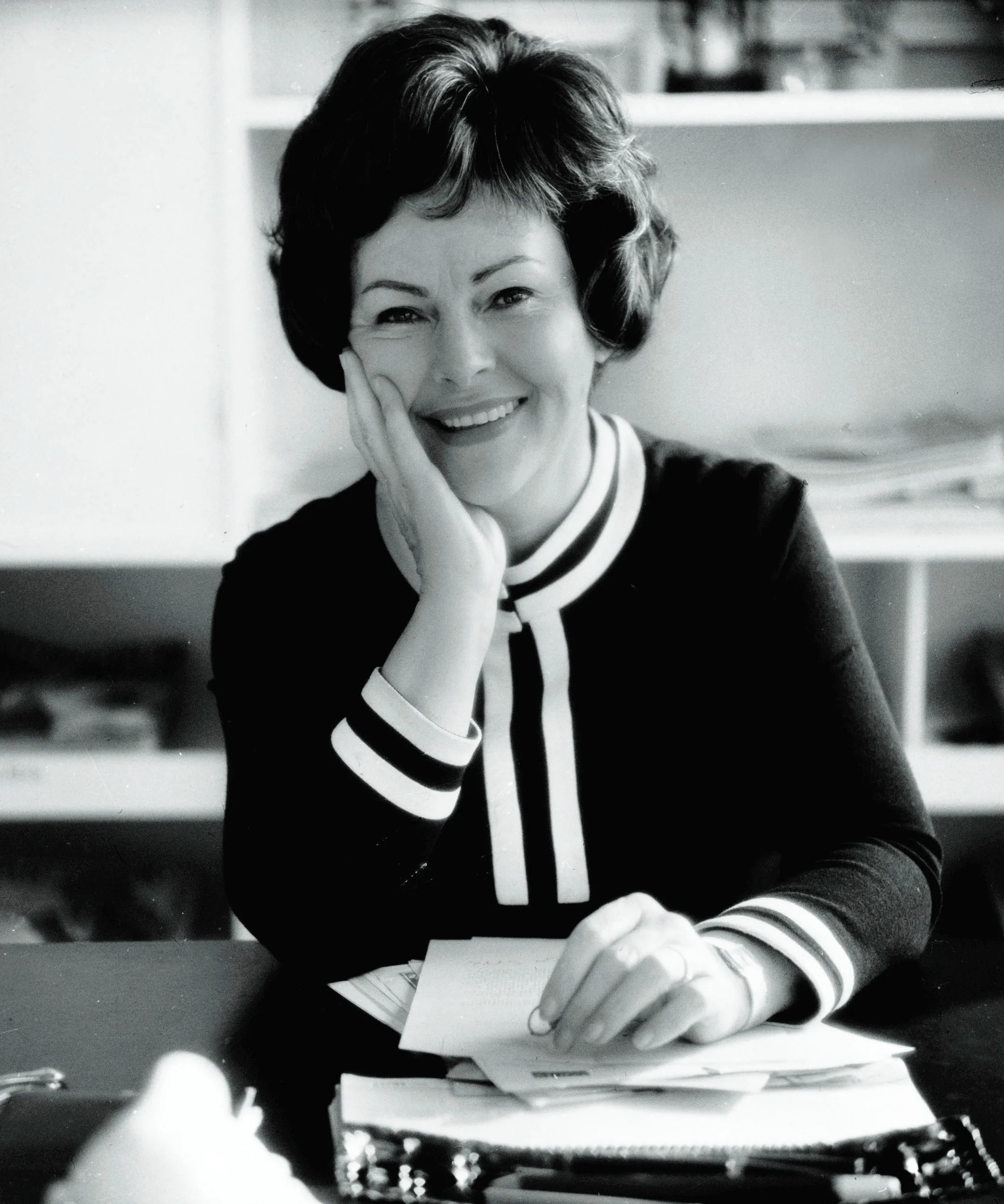 Aenne Burda in a portrait at her desk