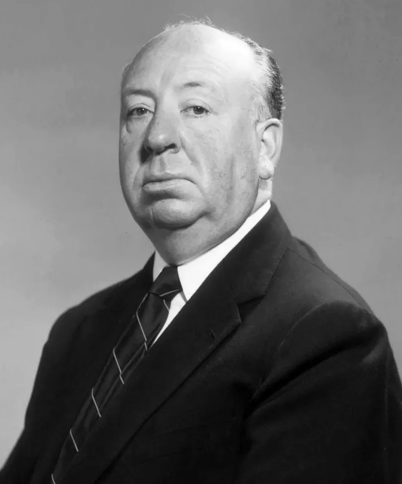 Alfred Hitchcock in a studio portrait
