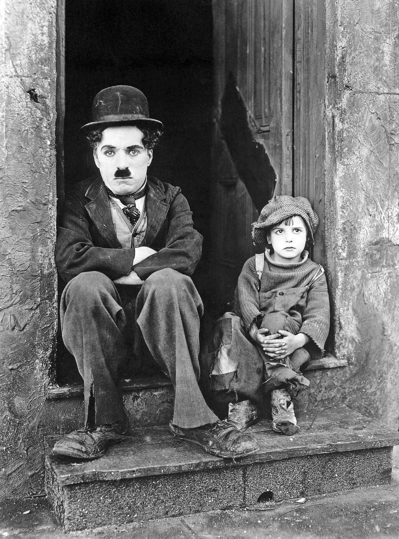 Charlie Chaplin und Jackie Coogan in The Kid