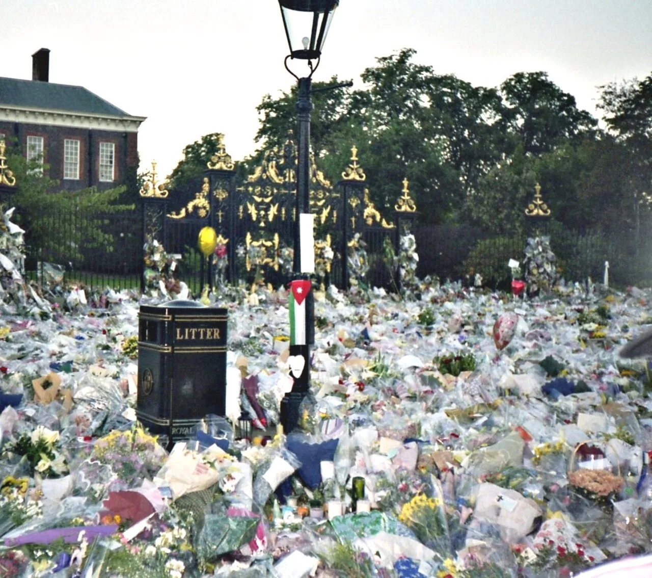 Sea of floral tributes at the Kensington Palace gates after Diana's death, 1997